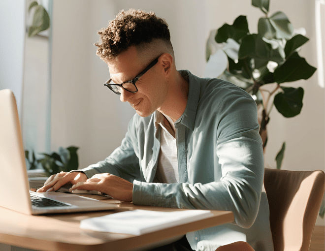 The Fascinating Truths About Learning Gambling on Indonesian Gacor Slots Sites like VSlots88 Soft natural light falls on a Caucasian man contentedly working on his laptop at a minimalist desk a coffee cup beside him - The Fascinating Truths About Learning Gambling on Indonesian Gacor Slots Sites like VSlots88